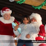 Santa-goes-to-boo-bar-13-150x150 Santa and Mrs. Claus visit BooBar with gifts for Fire Dept.