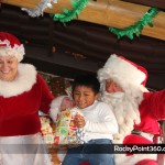 Santa-goes-to-boo-bar-14-150x150 Santa and Mrs. Claus visit BooBar with gifts for Fire Dept.