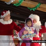 Santa-goes-to-boo-bar-15-150x150 Santa and Mrs. Claus visit BooBar with gifts for Fire Dept.