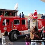 Santa-goes-to-boo-bar-25-150x150 Santa and Mrs. Claus visit BooBar with gifts for Fire Dept.