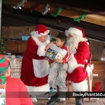 Santa-goes-to-boo-bar-7-150x150 Santa and Mrs. Claus visit BooBar with gifts for Fire Dept.
