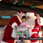 Santa-goes-to-boo-bar-9-150x150 Santa and Mrs. Claus visit BooBar with gifts for Fire Dept.